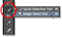 Selecting the Magic Wand Tool from the Tools panel in Photoshop. Image © 2016 Photoshop Essentials.com