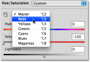 Selecting Reds from the color selection box in the Hue/Saturation dialog box in Photoshop. Image © 2010 Photoshop Essentials.com
